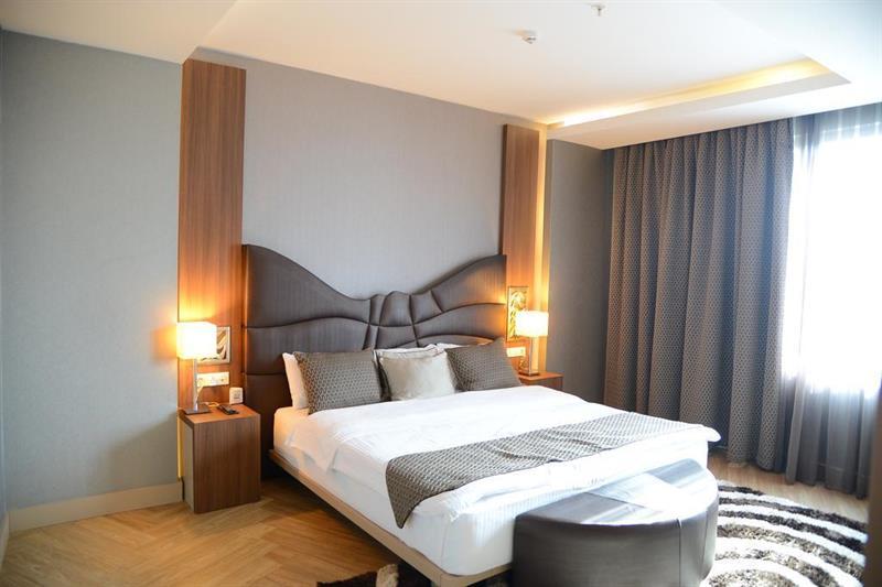 Titanic Hotel & Spa Sulaymaniyah Exterior foto A bedroom at the hotel